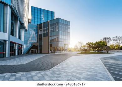 Impressive panoramic photo of skyscrapers against a bright blue sky. This urban scene showcases modern architecture including tall buildings and a sparkling city skyline. Perfect as a visual backdrop.