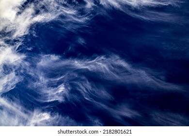 Impressive View Of Clouds Resembling Angry Waves. Sky And Cloud Background In Waveform. Wavy Sky Wallpaper.