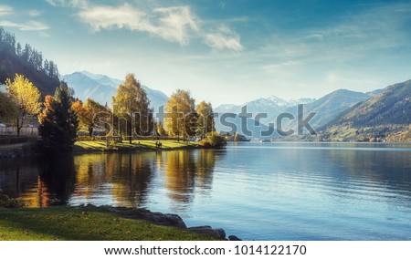 Impressively beautiful Fairy-tale mountain lake in Austrian Alps. Breathtaking Scene. Panoramic view of beautiful mountain landscape in Alps with Zeller Lake in Zell am See, Salzburger Land, Austria
