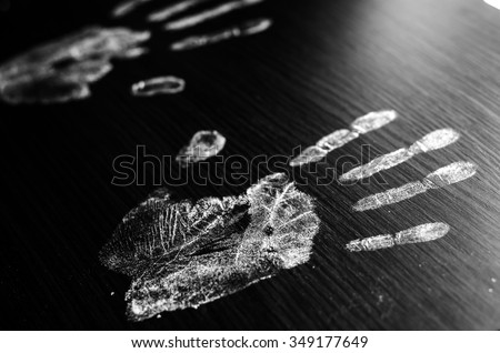 Imprint of human hands,black background