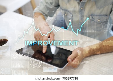 Improvement graph on virtual screen. Business and technology concept. 