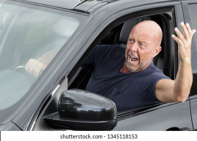 Impulsive And Energetic Mature Man Shouting Out Of The Window