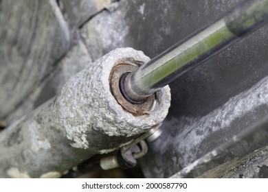 Inboard Motor Boat Stern Drive Power Trim And Tilt Cylinder Corrosion With A Cracked Seal And Stem After Use In Salt Water Closeup