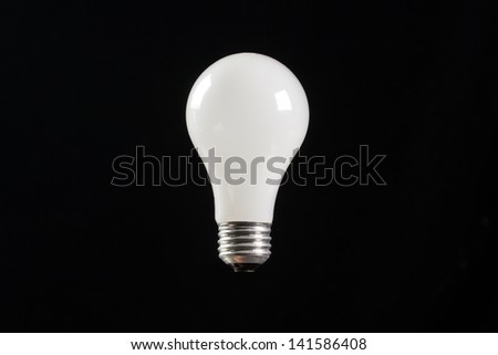 incandescent light buld with a black background