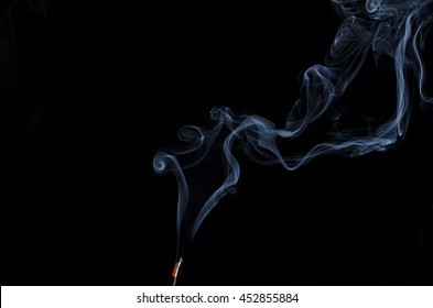 Incense Smoke On Black Backdrop