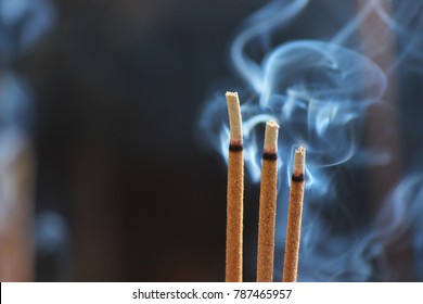 Incense Sticks Burning With Smoke