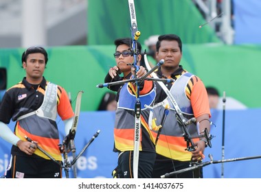 INCHEON, KOREA : Malaysia Athlete Competing In The Gyeyang Asiad Archery Field, The 2014 Asian Games On September 25, 2014