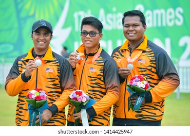 INCHEON, KOREA : Malaysia Athlete  With Medal After Competing In The Gyeyang Asiad Archery Field, The 2014 Asian Games On September 25, 2014