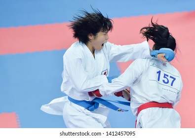 INCHEON, KOREA : Noise. Grain. Motion Blur. Women's Karate Athletes During The 2014 Asian Games At Gyeyang Gymnasium On October 03, 2014