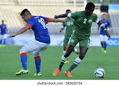 INCHEON September 17, 2014 -  Malaysian Football Team, (Blue Jersey), In Action Against The Football Team Of Saudi Arabia At Asian Games In Incheon, Korea.