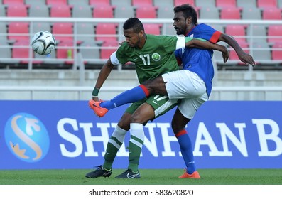 INCHEON September 17, 2014 -  Malaysian Football Team, (Blue Jersey), In Action Against The Football Team Of Saudi Arabia At Asian Games In Incheon, Korea.