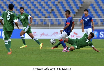 INCHEON September 17, 2014 -  Malaysian Football Team, (Blue Jersey), In Action Against The Football Team Of Saudi Arabia At Asian Games In Incheon, Korea.