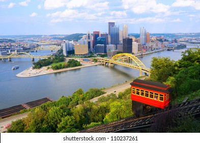 Incline operating in front of the downtown skyline of Pittsburgh, Pennsylvania, USA.