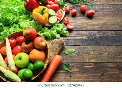 Include fresh organic vegetables basket on wooden floor with copy space still life - Powered by Shutterstock