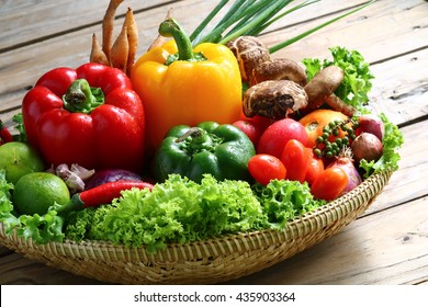 Include vegetables on wooden floor with copy space - Shutterstock ID 435903364