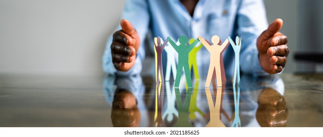 Inclusion, Diversity And Equality. African Hands Safeguard Paper Shapes - Shutterstock ID 2021185625