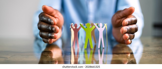 Inclusion, Diversity And Equality. African Hands Safeguard Paper Shapes - Shutterstock ID 2028661325
