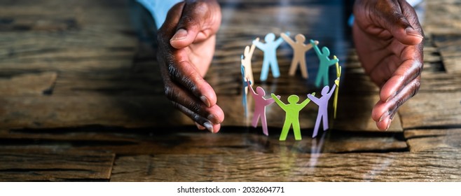 Inclusion, Diversity And Equality. African Hands Safeguard Paper Shapes - Shutterstock ID 2032604771