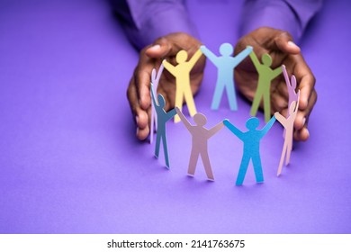 Inclusion, Diversity And Equality. African Hands Safeguard Paper Shapes - Shutterstock ID 2141763675