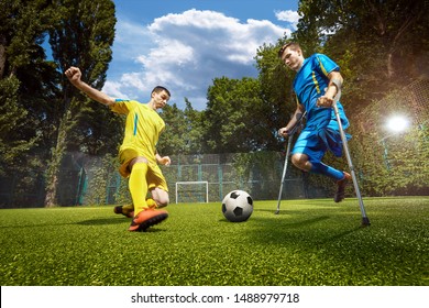 Inclusion soccer player. Cerebral palsy. Amputants - Powered by Shutterstock