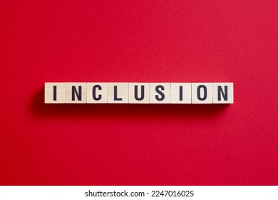 Inclusion - word concept on cubes - Shutterstock ID 2247016025