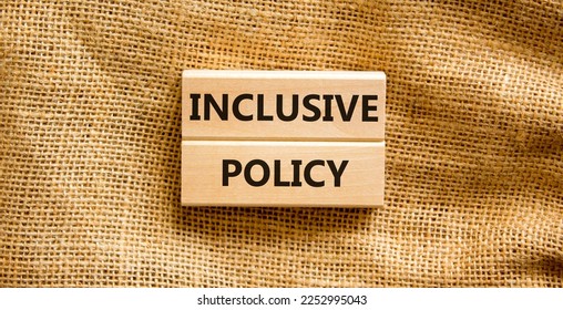 Inclusive policy symbol. Wooden blocks with words Inclusive policy on beautiful canvas background. Business, HR and inclusive policy concept. Copy space. - Shutterstock ID 2252995043