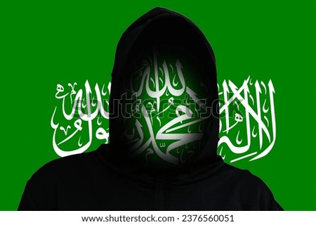 Incognito terrorist on the Flag Hamas background. Hamas between Israel and Palestine. Israel Palestine war. World crisis in Middle East. Rebellion. Rebel militant terrorist guerrilla concept. 