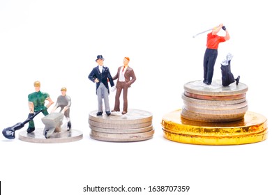 Income Gap Concept With Labour, Middle Class And CEO Playing Golf Miniature. The Harder The Labour And Worker Work, The Higher The CEO Will Earn.