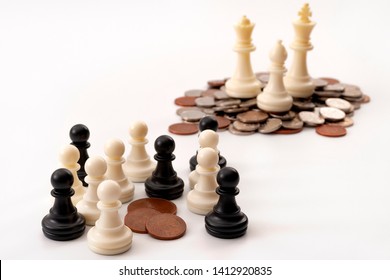 Income inequality and social issue concept theme with large group of chess pawns representing the poor and the middle class splitting a significantly smaller amount of money that a small group of rich