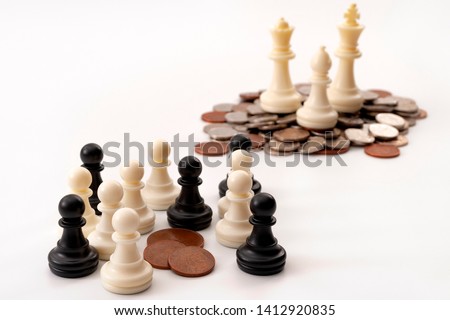 Income inequality and social issue concept theme with large group of chess pawns representing the poor and the middle class splitting a significantly smaller amount of money that a small group of rich Zdjęcia stock © 