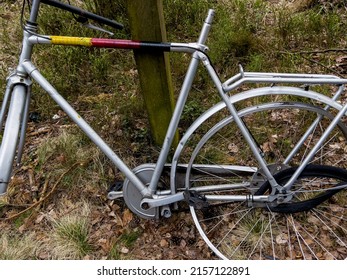 An Incomplete, Old Bike Left In The Woods By The Bike Path