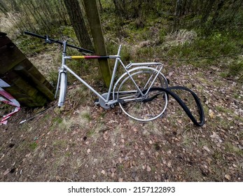 An Incomplete, Old Bike Left In The Woods By The Bike Path