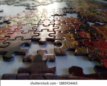
an incomplete puzzle and missing pieces