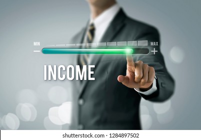Increase income, Boost income or business growth concept. Businessman is pulling up progress bar with the word INCOME on bright tone background. - Shutterstock ID 1284897502
