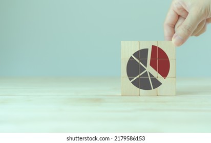 Increase Market Share, Growth Of Business Profit Concept. Market Penetration And Expansion Strategies. Wooden Cubes Showing A Market Share Percentage Using A Pie Chart. Strengthen Business Strategies.