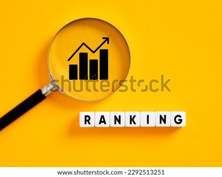 Increase ranking. Search engine optimization SEO rankings concept. The word ranking on white cubes with a magnifier on a graph icon.
