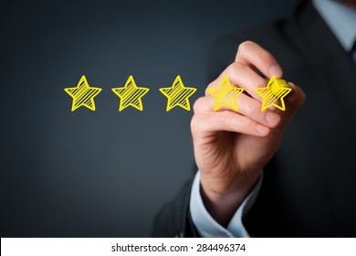 Increase rating, evaluation and classification concept. Businessman draw five yellow star to increase rating of his company.