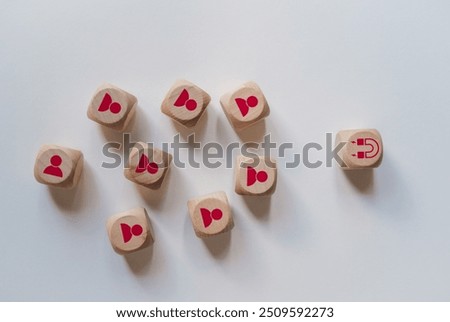 Increasing customer loyalty, Developing brand awareness, Understanding customer need, Providing value, Create relationship with customer engagement, Wood cube with customer icon.