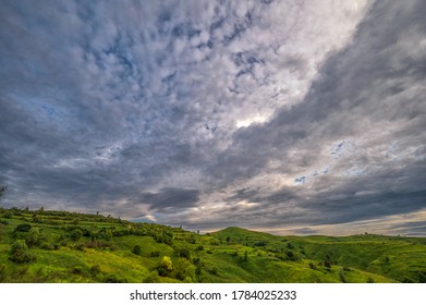 Incredible cloudscape and a yellow tree