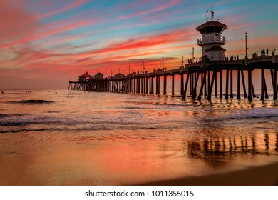 Incredible colors of sunset by Huntington Beach Pier, in the famous surf city in California - Powered by Shutterstock