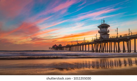 Incredible colors of sunset by Huntington Beach Pier, in the famous surf city in California - Powered by Shutterstock