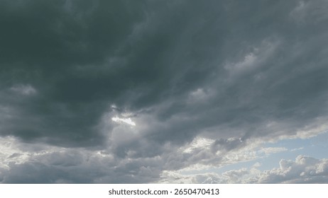 An Incredible and Dramatic Cloud Formation with Intermittent Rays of Sunlight Peeking Through