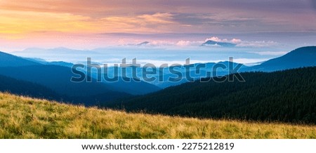 An incredible scene of dawn over the mountain ranges. Location place Carpathian mountains, Ukraine, Europe. Photo wallpaper. Picturesque image of wild area. Discover the beauty of earth.