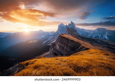 Incredible sharp peaks of the Odle mountain massif (Geisler Group). Location place Dolomite alps, Puez Odle National Park, Seceda peak, Italy, Europe. Photo wallpaper. Discover the beauty of earth. - Powered by Shutterstock