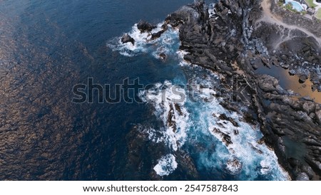 Similar – Aerial Drone View Of Dramatic Ocean Waves Crushing On Rocky Landscape