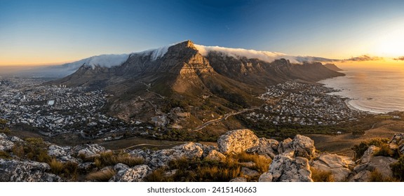 The incredible view from Lion's Head over Table Mountain, Cape Town and Camps Bay at sunset, Cape Town, South Africa. - Powered by Shutterstock