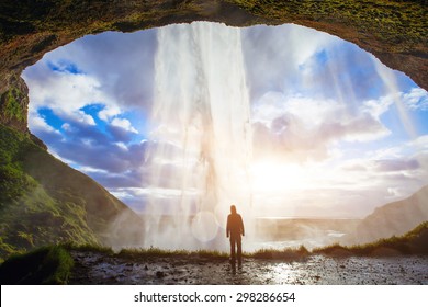 Incredible Waterfall In Iceland, Silhouette Of Man Enjoying Amazing View Of Nature