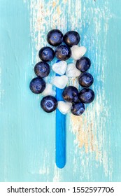 incredients for a homemade blueberry water-ice or icecream, flatlay