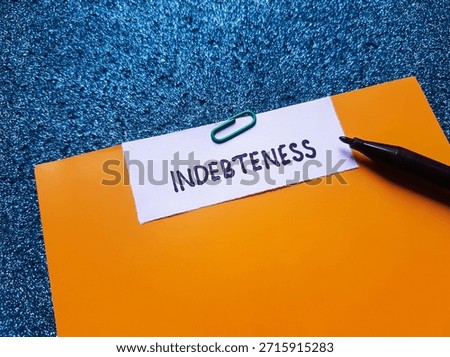 Indebteness writting on table background. 