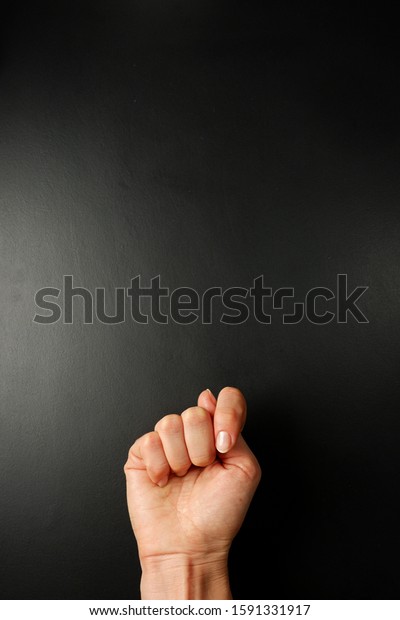 Fist With Thumb Through Index Finger